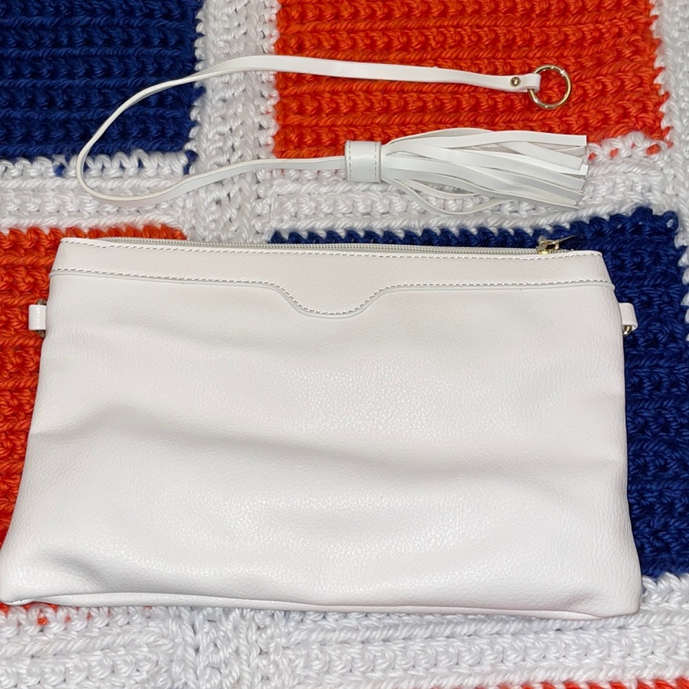 unused crossbody bag with tassel